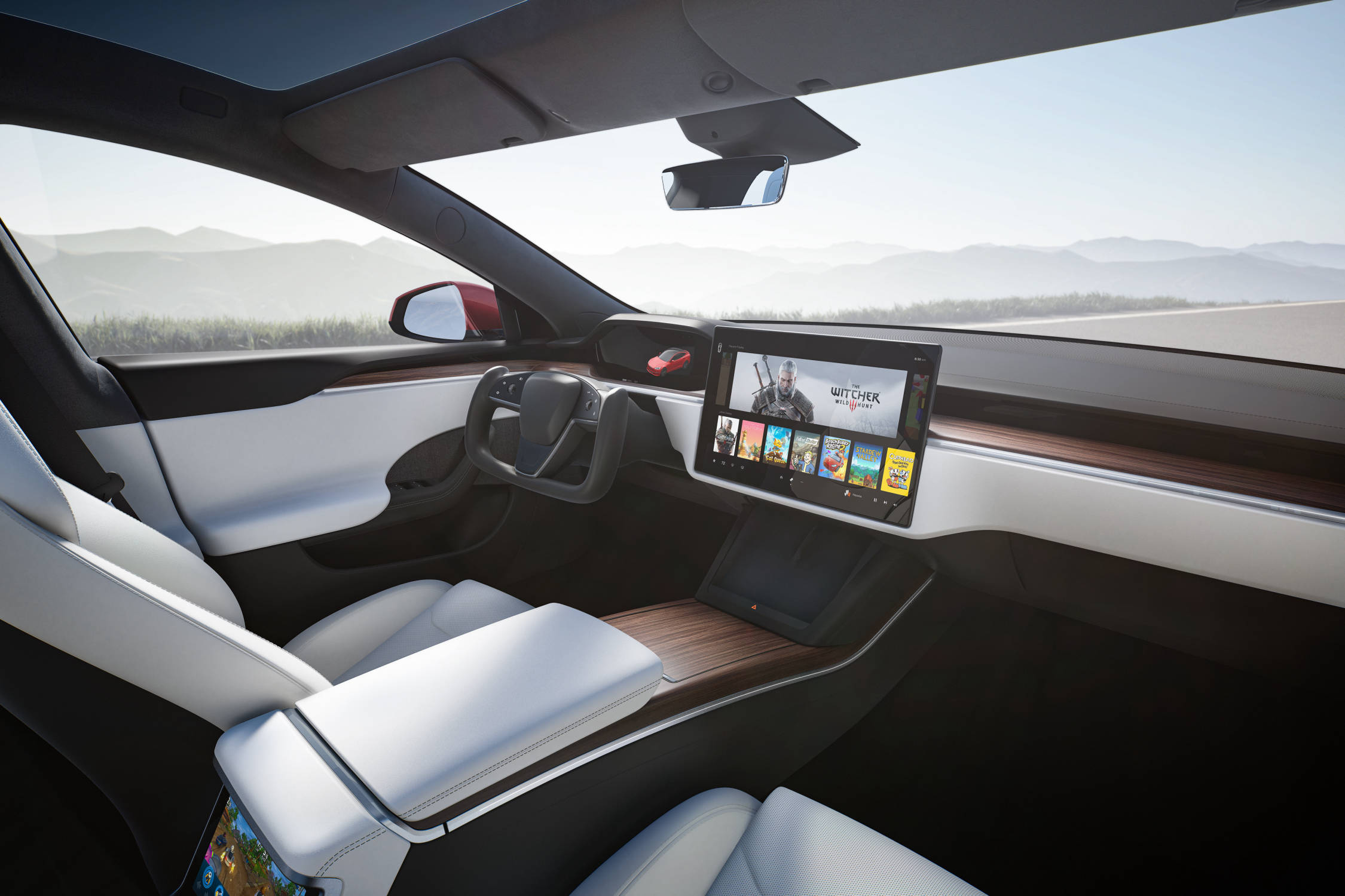 Tesla Model S Plaid - Хүссэн тоглоомоо машинаасаа тоглох боломжтой.