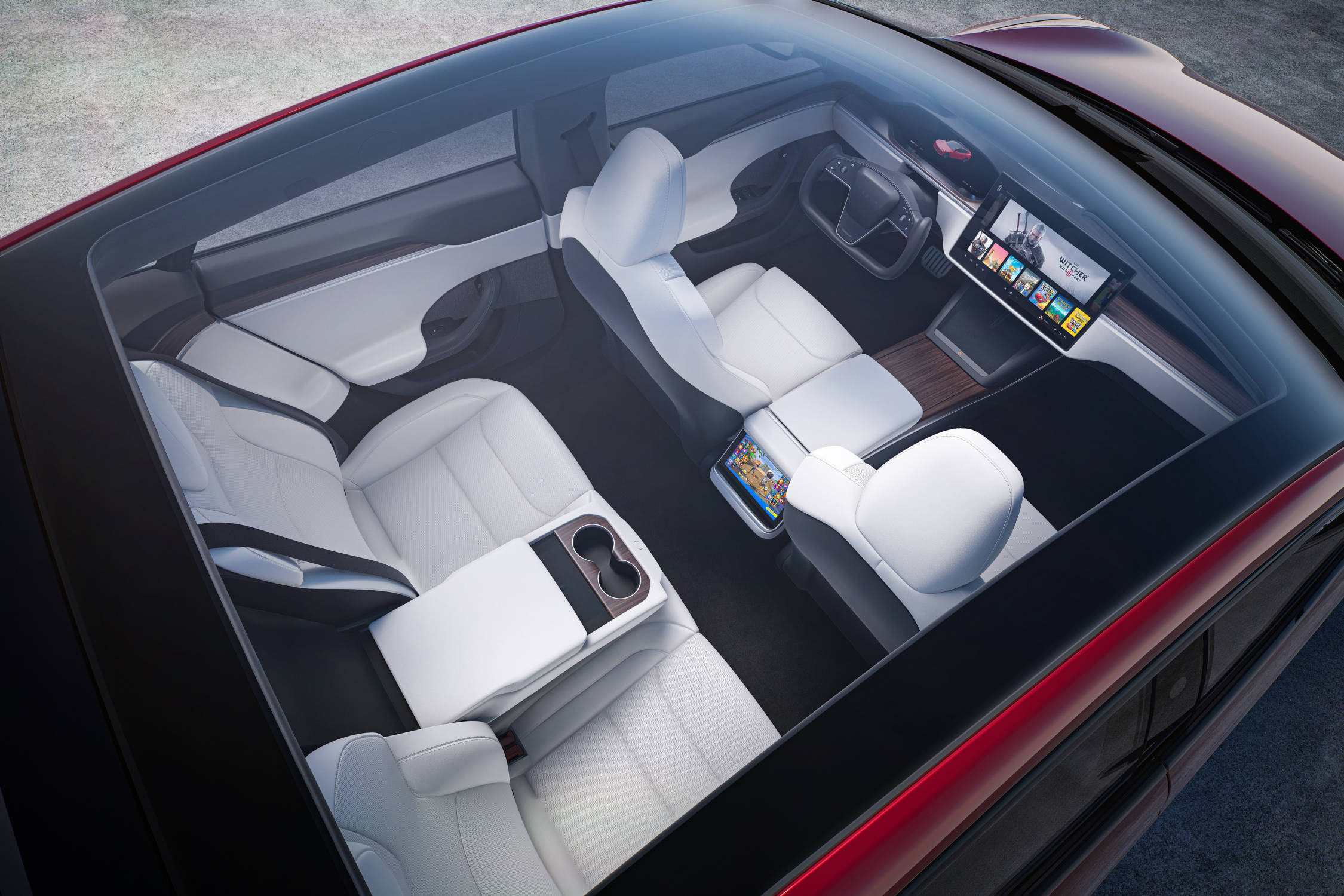 Tesla Model S Plaid - Хүссэн тоглоомоо машинаасаа тоглох боломжтой.